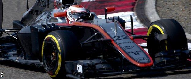 Jenson Button was in a late scrape with Pastor Maldonado but managed to bring his McLaren home