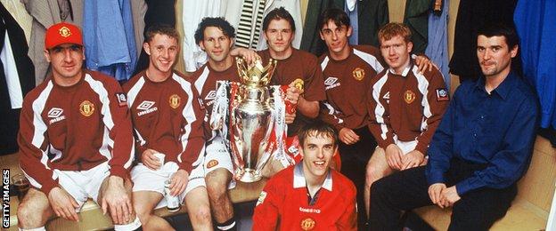 Eric Cantona with Premier League trophy in 1997