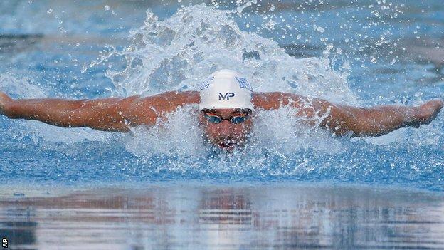 Michael Phelps en route to victory in the 100m butterfly in Phoenix