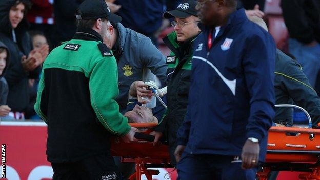 Toby Alderweireld is stretchered off during his side's loss against Stoke