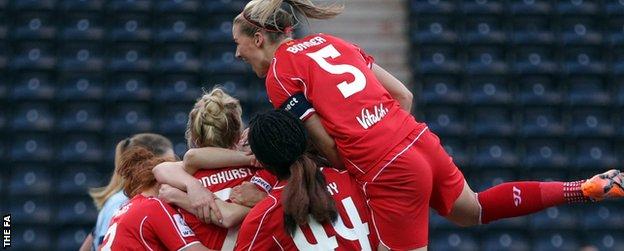 Liverpool celebrate Line Smorsgard's winner against Manchester City Women