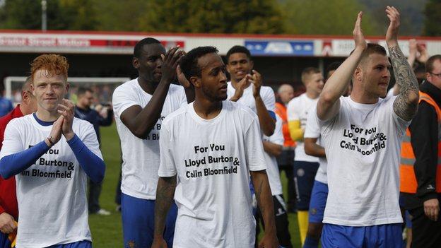 Shrewsbury's players donned t-shirts in honour of two Town fans, Colin Bloomfield and young Lloyd Burton, who died this week.