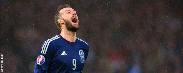 Steven Fletcher celebrates scoring for Scotland