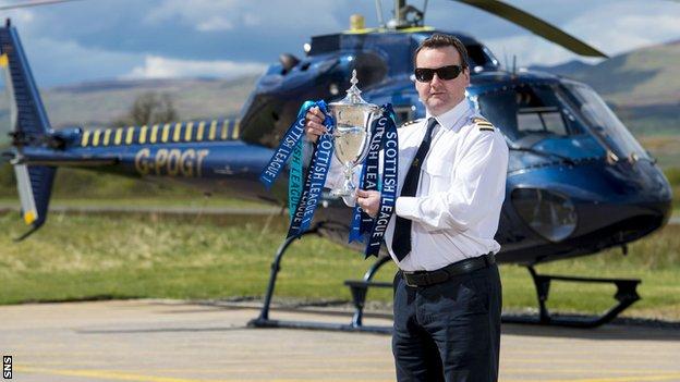 Helicopter pilot David Blane delivered the Scottish League One trophy to Morton at Cappielow