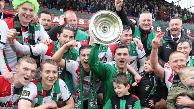 Glentoran celebrate their Irish Cup triumph - the 22nd time the east Belfast club have won the competition