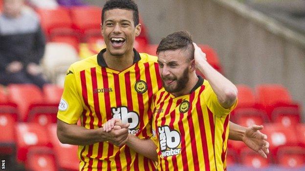 Partick Thistle's Steven Lawless (right) celebrates with Lyle Taylor