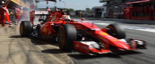 Sebastian Vettel leaves the pit lane