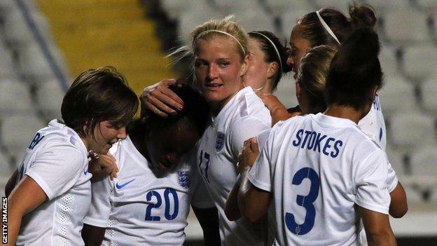 Katie Chapman (centre) and Fran Kirby (left) celebrate with Eni Aluko (number 20) after a goal during the Cyprus Cup match between England and Netherlands