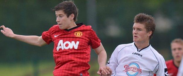 Paddy McNair in Milk Cup action for Manchester United against Revo Express in Ballymoney