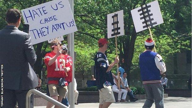 Four Pats fans protest at NFL HQ