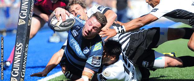 Alex Cuthbert touches down for the first of his two tries against Zebre at the Arms Park