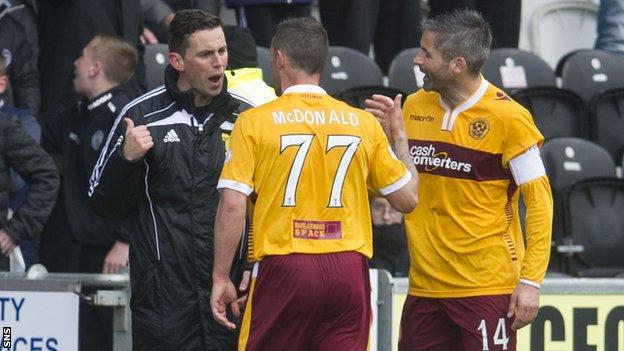 Motherwell's Scott McDonald has words with fourth official Andrew Dallas after he was sent off