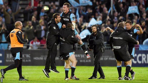Stuart Hogg (top) celebrates with team-mates after Glasgow Warriors' win