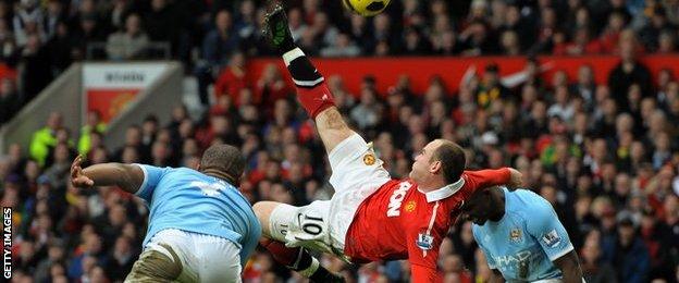 Wayne Rooney scores for Macnhester United against Manchester City in 2011