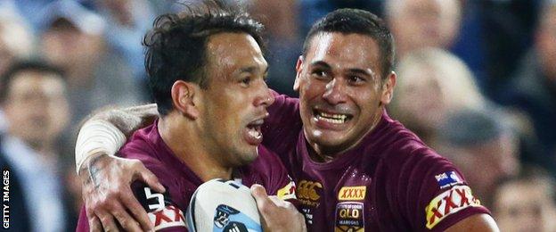 Will Chambers celebrates his try with Justin Hodges