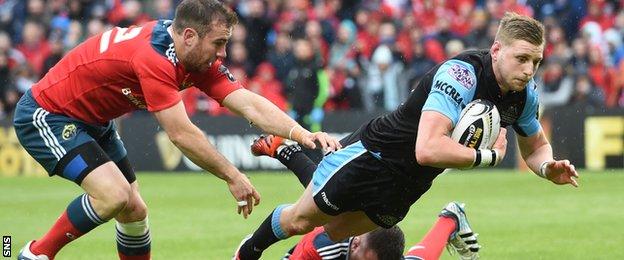 Finn Russell darts through to score Glasgow's fourth try