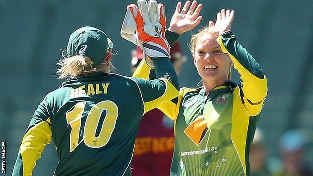 Kristen Beams (right) celebrates a wicket