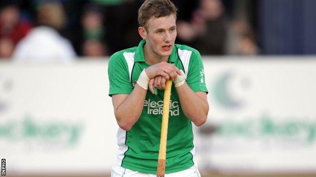 Former Ireland player David Ames is included in the Great Britain hockey squad for the main Olympic qualifying tournament in Antwerp.