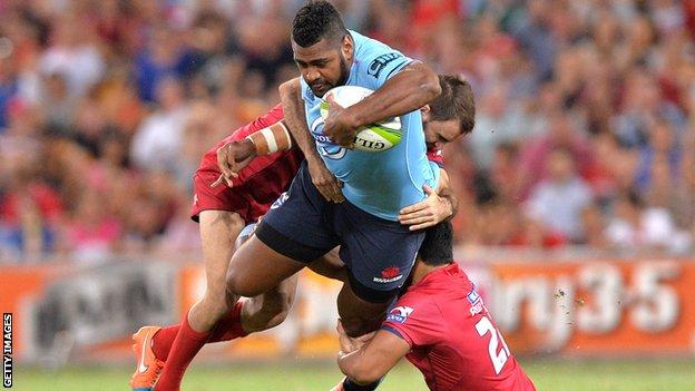 Taqele Naiyaravoro of the Waratahs charges in to the defence during the Super Rugby match against the Queensland Reds
