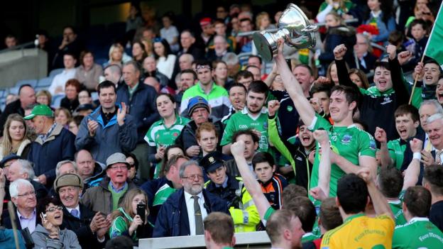 Fermanagh's John Paul McGarry lifts the Lory Meagher Cup after the Ulster county's win over Sligo at Croke Park