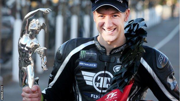 Ian Hutchinson wins an emotional Supersport TT race on the Isle of Man
