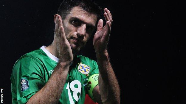 Northern Ireland defender Aaron Hughes is interested in a move abroad