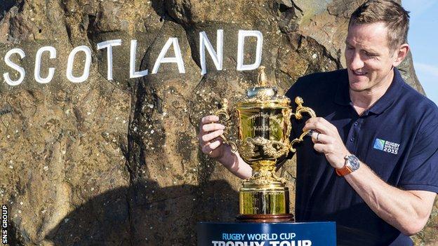 Former World Cup winner Will Greenwood welcomes the trophy to Scotland