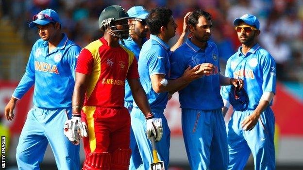 India celebrate the dismissal of Zimbabwe's Sikandar Raza
