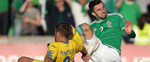 Mihai Pintilii was fortunate not to be red-carded for this challenge on Conor McLaughlin