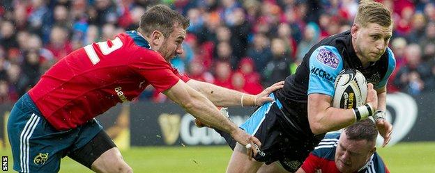 Glasgow fly-half Finn Russell in action against Munster