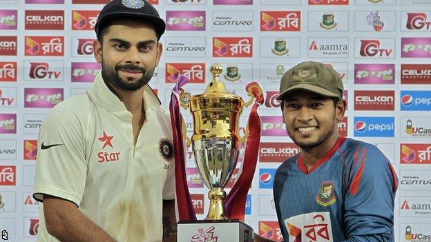 India captain Virat Kohli and Bangladesh skipper Mushfiqur Rahim with the Test series trophy