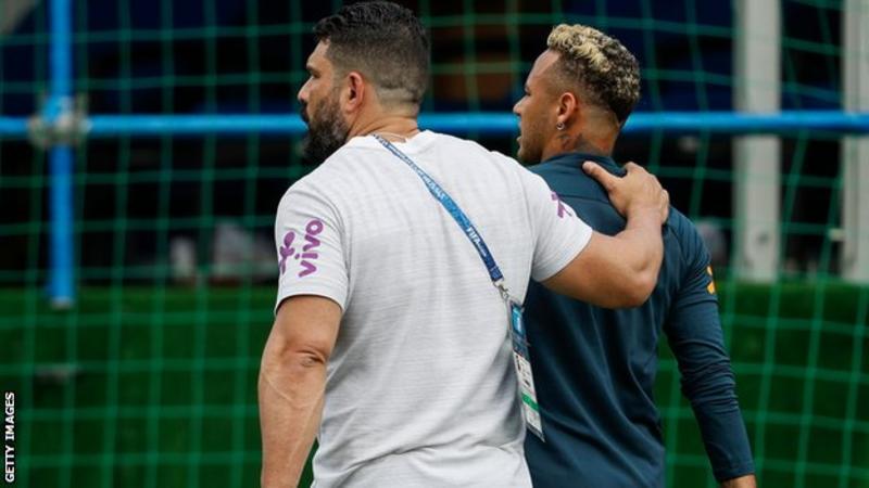 Neymar hobbles out of training