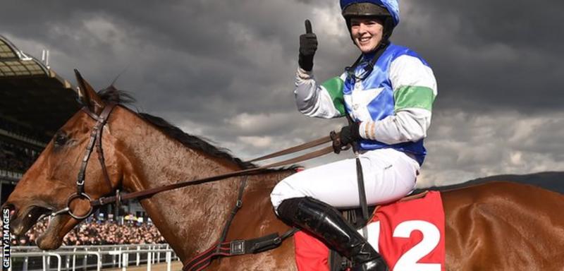 Jockey Lizzie Kelly celebrates after winning 2018 Cheltenham Cup's The Ultima Handicap Steeple Chase on Coo Star Sivola