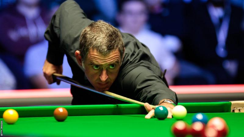 Ronnie O'Sullivan stuck to world number one after edging past Ken Doherty at Wuhan Open.