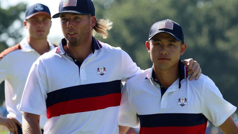 USA's Sam Burns puts his arm on Collin Morikawa's shoulder during day two of the Ryder Cup