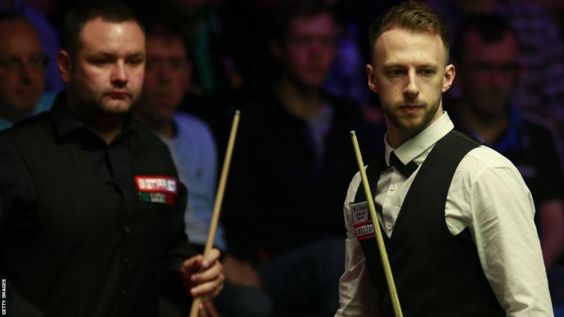 Stephen Maguire stunned Judd Trump at the International Snooker Championship in China.