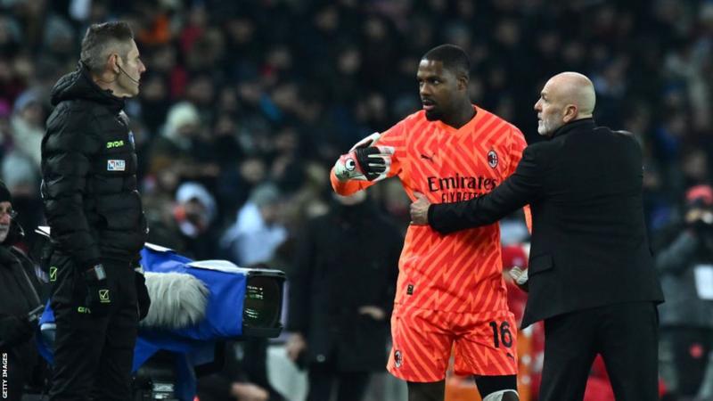 AC Milan’s victory against Udinese was briefly halted on Saturday following alleged racial abuse from home fans towards Milan goalkeeper Mike Maignan