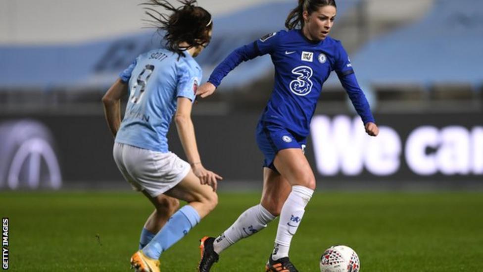 Melanie Leupolz of Chelsea (right) takes on Manchester City's Jill Sco...