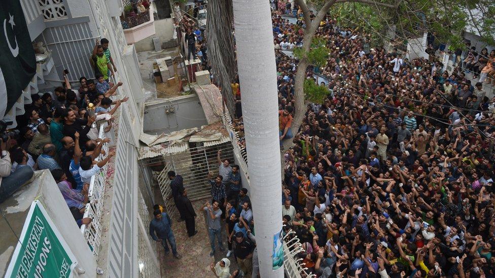 Fans outside Sarfraz Ahmed's home