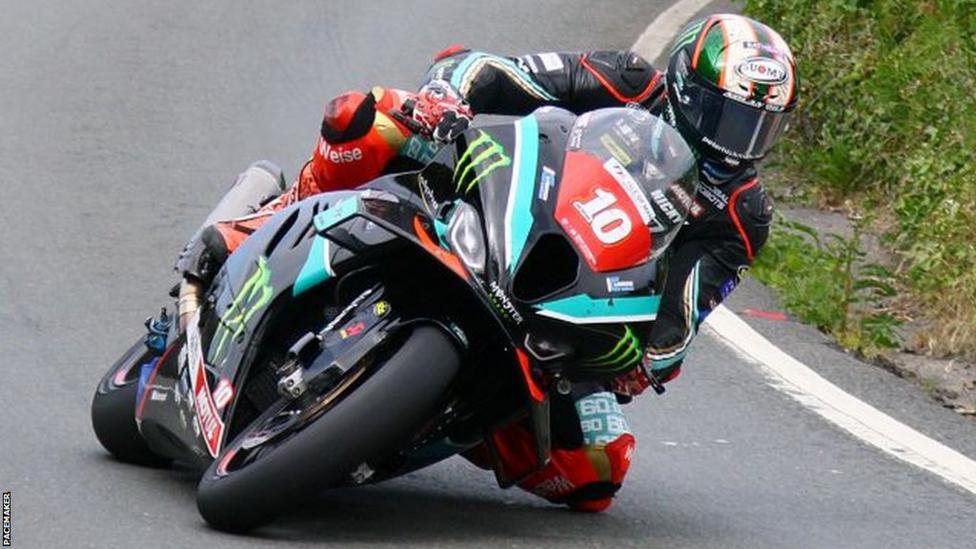 Isle of Man TT Peter Hickman shatters course lap record in completing