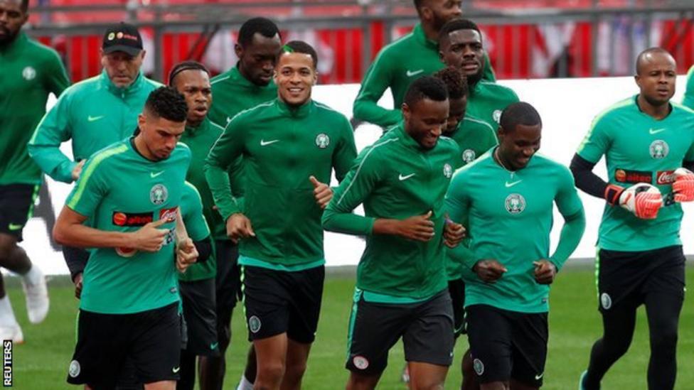 England v Nigeria Visiting players relax by singing at the piano