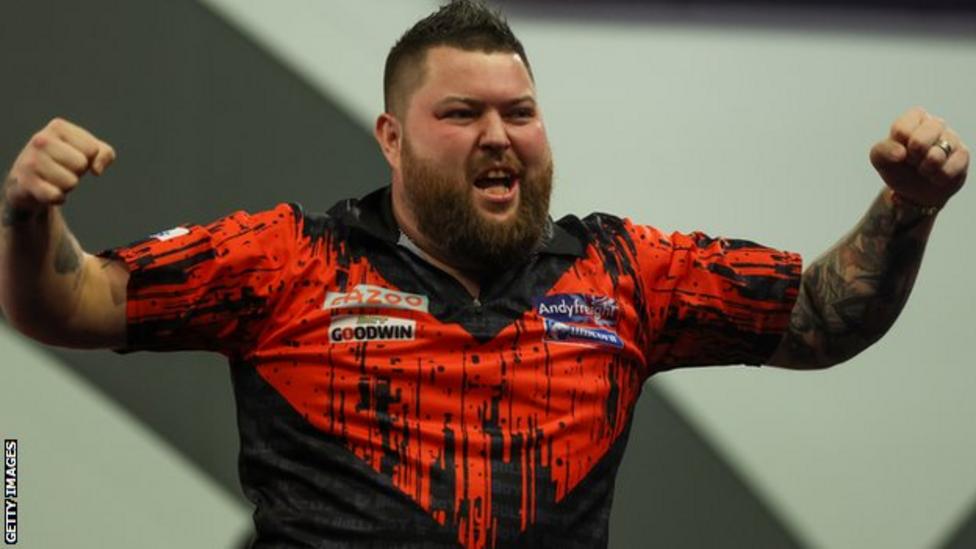 PDC World Championship: Michael Smith beats Michael van Gerwen to win