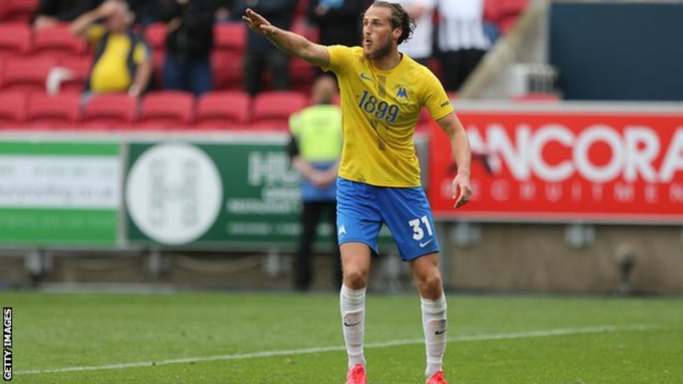 Joe Lewis Stockport County sign Torquay United defender on twoyear