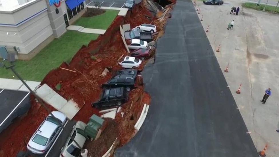 Giant US sinkhole swallows cars