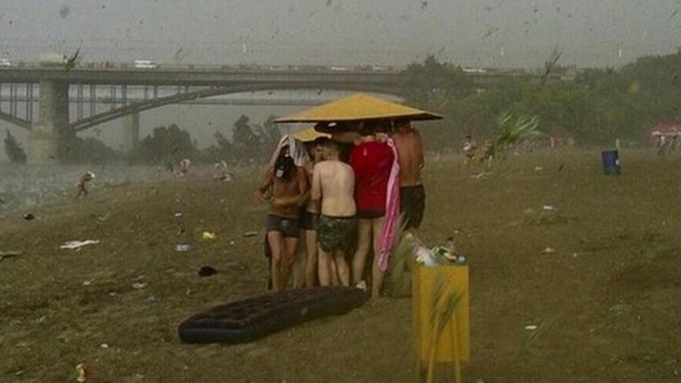 Surprise Hailstorm Hits Sunbathers On Russian Beach Cbbc Newsround