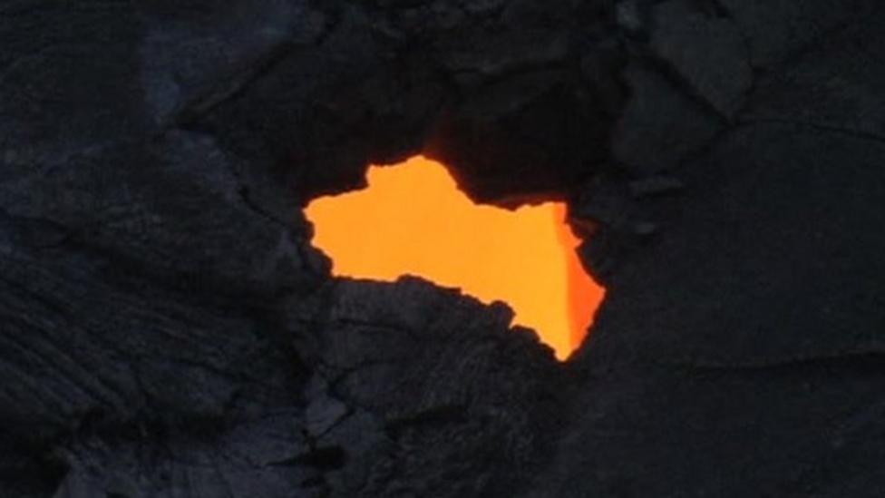 Volcano cracks reveal lava beneath