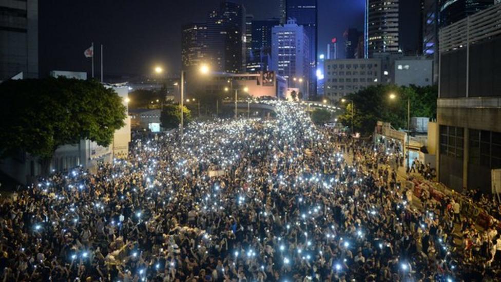 Protesters block Hong Kong's streets