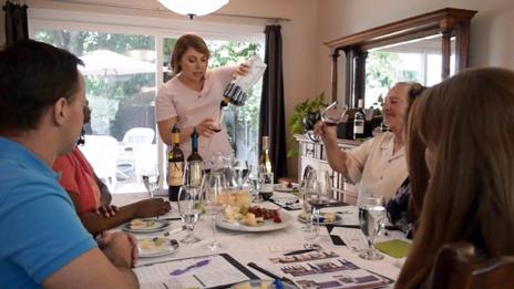 Diane Nozik leads a tasting for clients in California. (WineShop at Home)