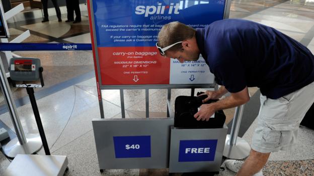 cost of checked bag spirit