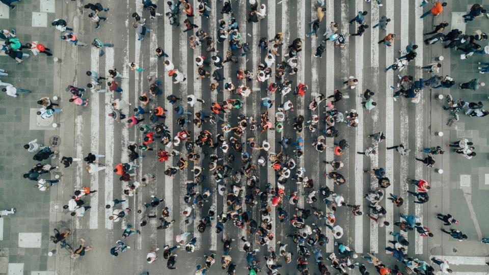People crossing street in Mexico City. People crossing street in Mexico City.